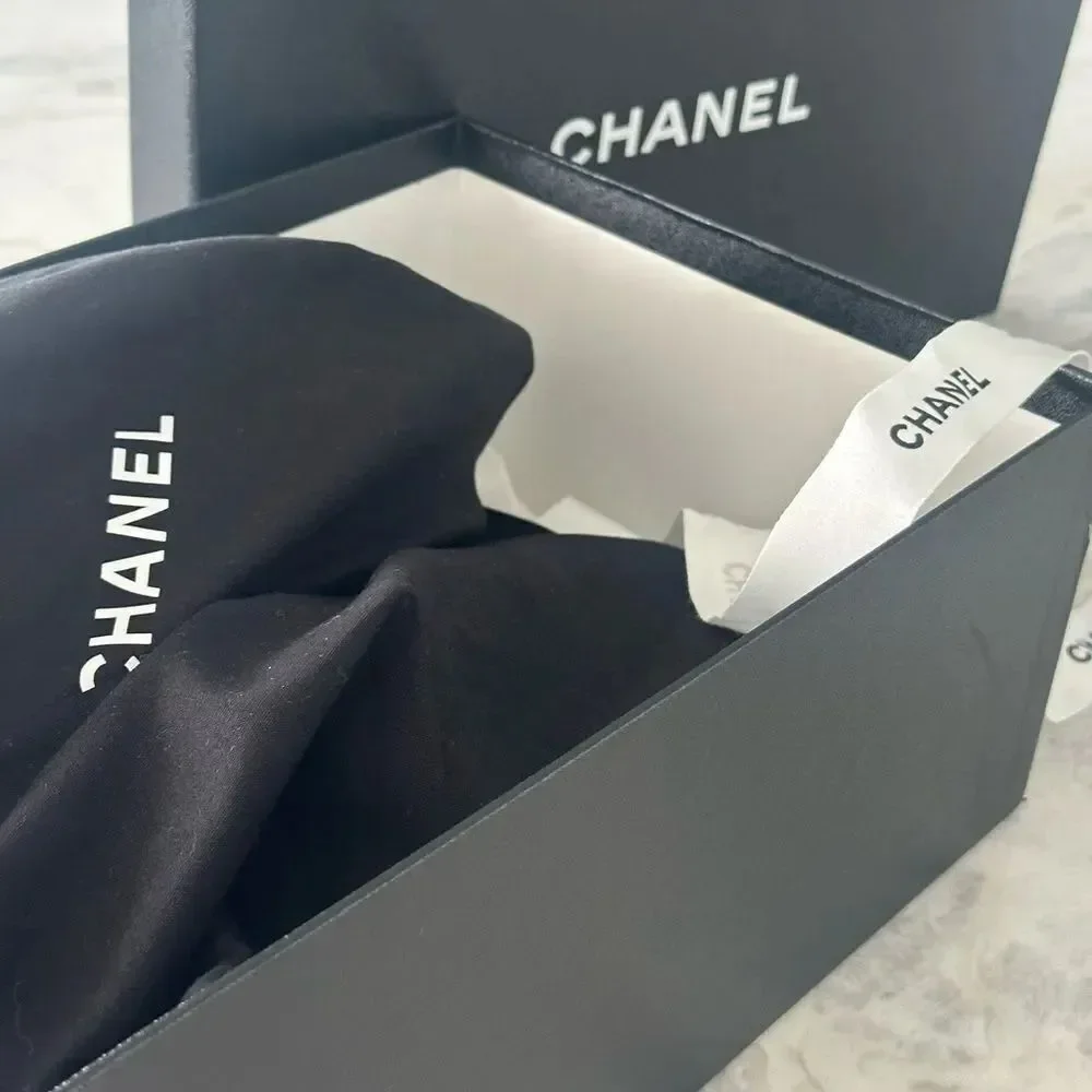 Chanel Woman’s White Sneakers with red and grey CC logo